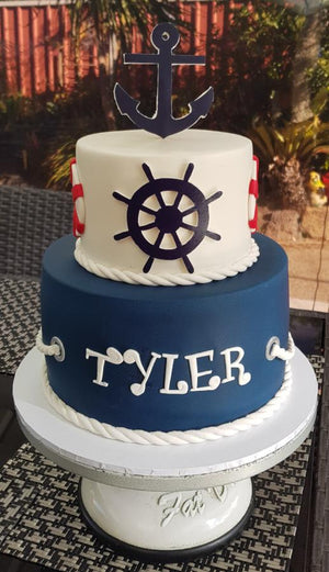 Nautical birthday cake anchor wheel