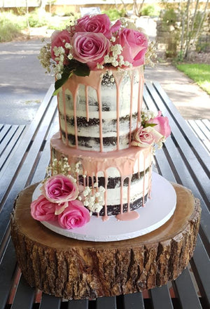 2 tier naked cake flowers pink drip