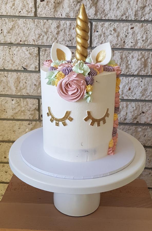 unicorn birthday cake gold horn buttercream