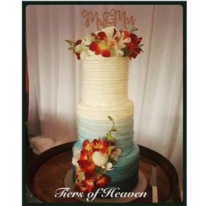 Blue Ombre Wedding Cake with Florals and Wooden Topper