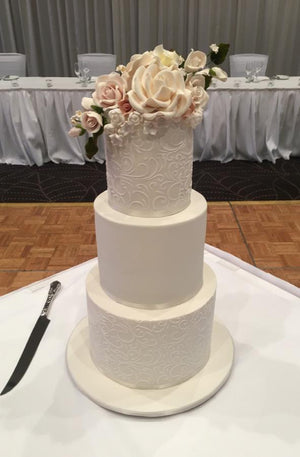 White Wedding Cake with Sugar Flowers