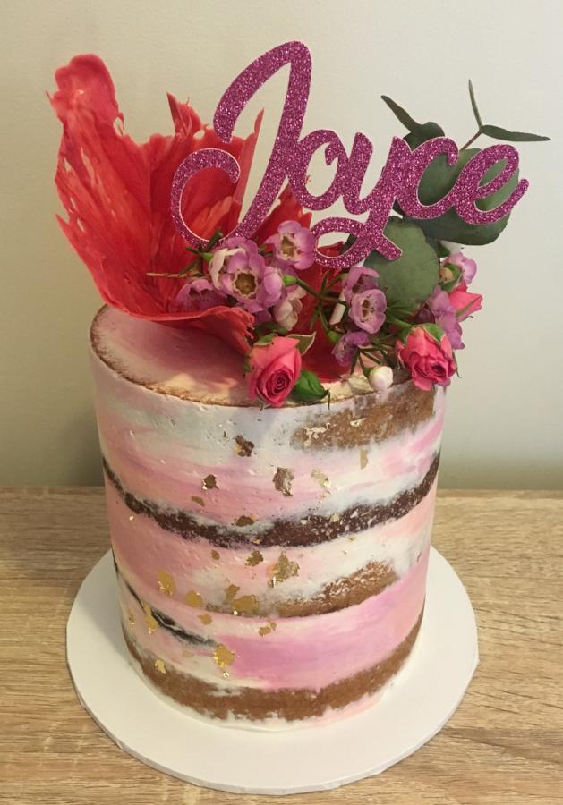birthday cake with chocolate sail flowers